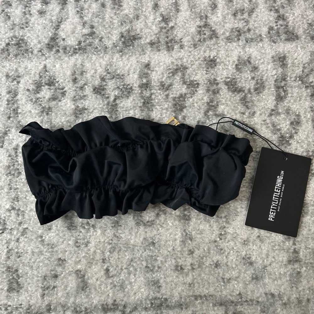 Strapless bikini top, never worn with tags.